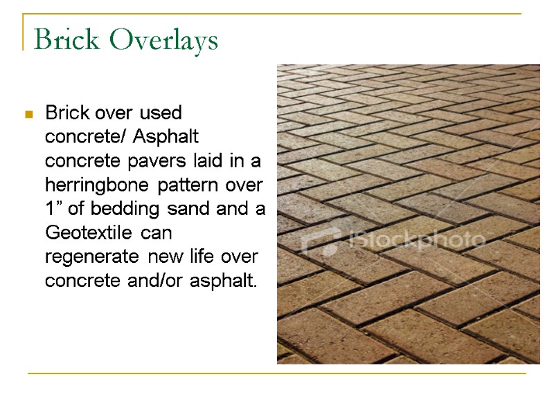 Brick Overlays Brick over used concrete/ Asphalt concrete pavers laid in a herringbone pattern